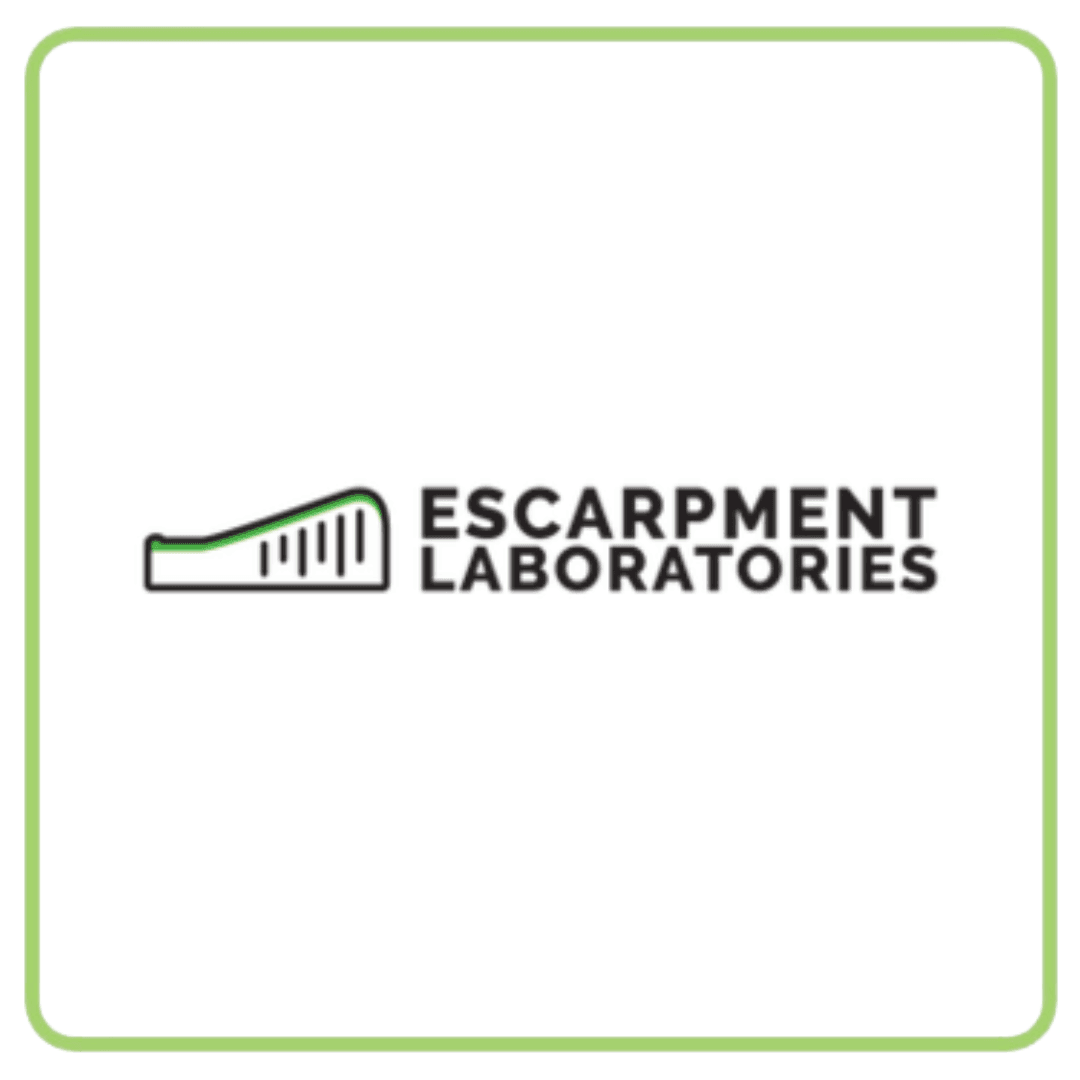 Logo for Escarpment Laboratories, featuring a green and black stylized landscape graphic.