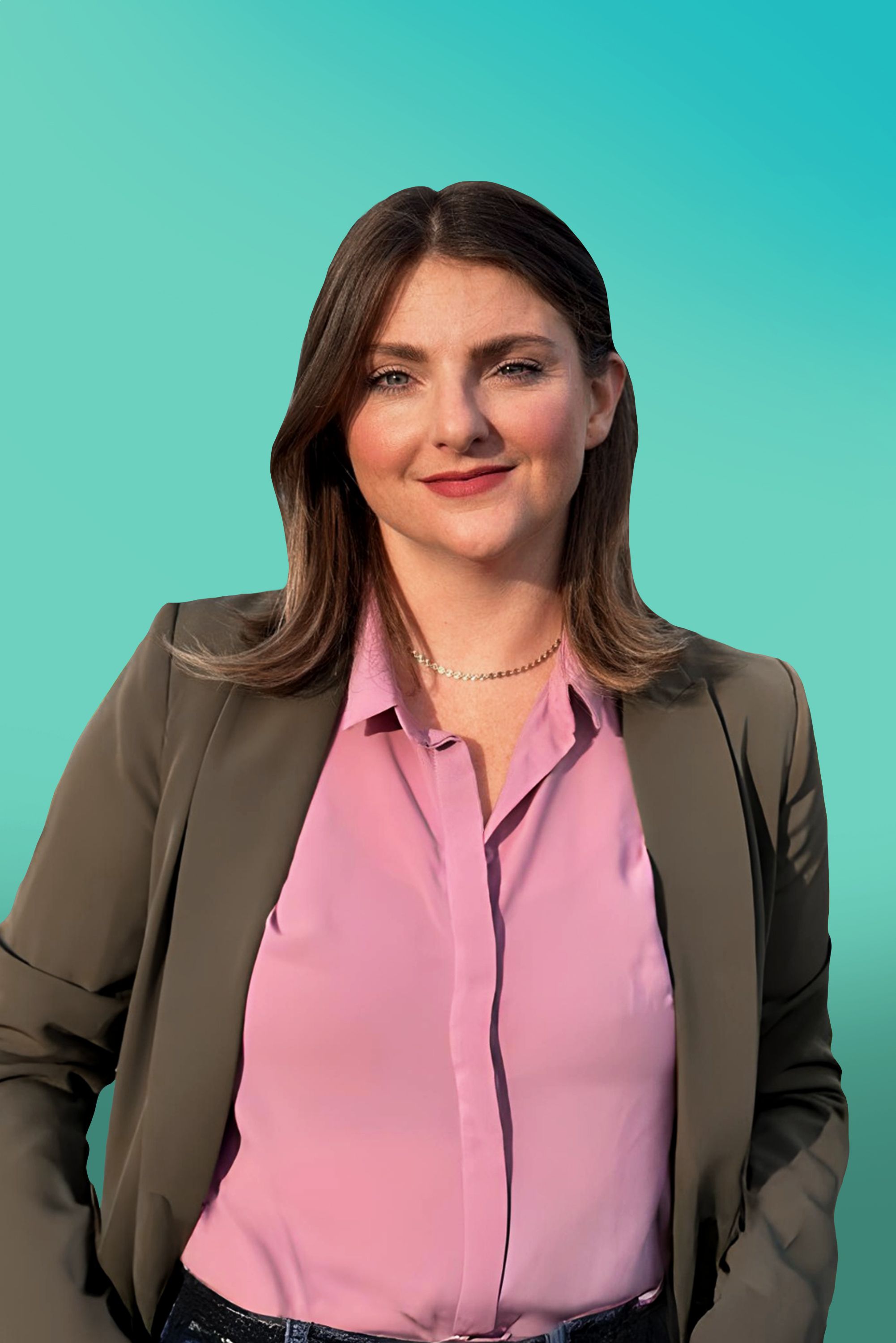 Smiling woman with brown hair wearing a pink shirt and dark blazer against a teal background.