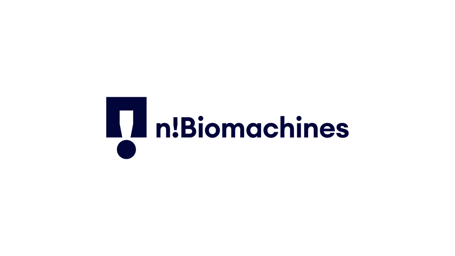 n!Biomachines logo featuring a stylized exclamation mark icon in dark blue.
